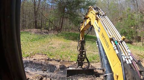 digging tunnel with skid steer|digging a drainage ditch youtube.